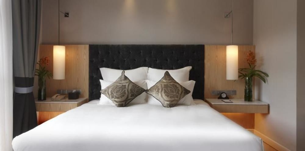 The Chateau Spa & Wellness Resort Bukit Tinggi Szoba fotó A bedroom at the hotel